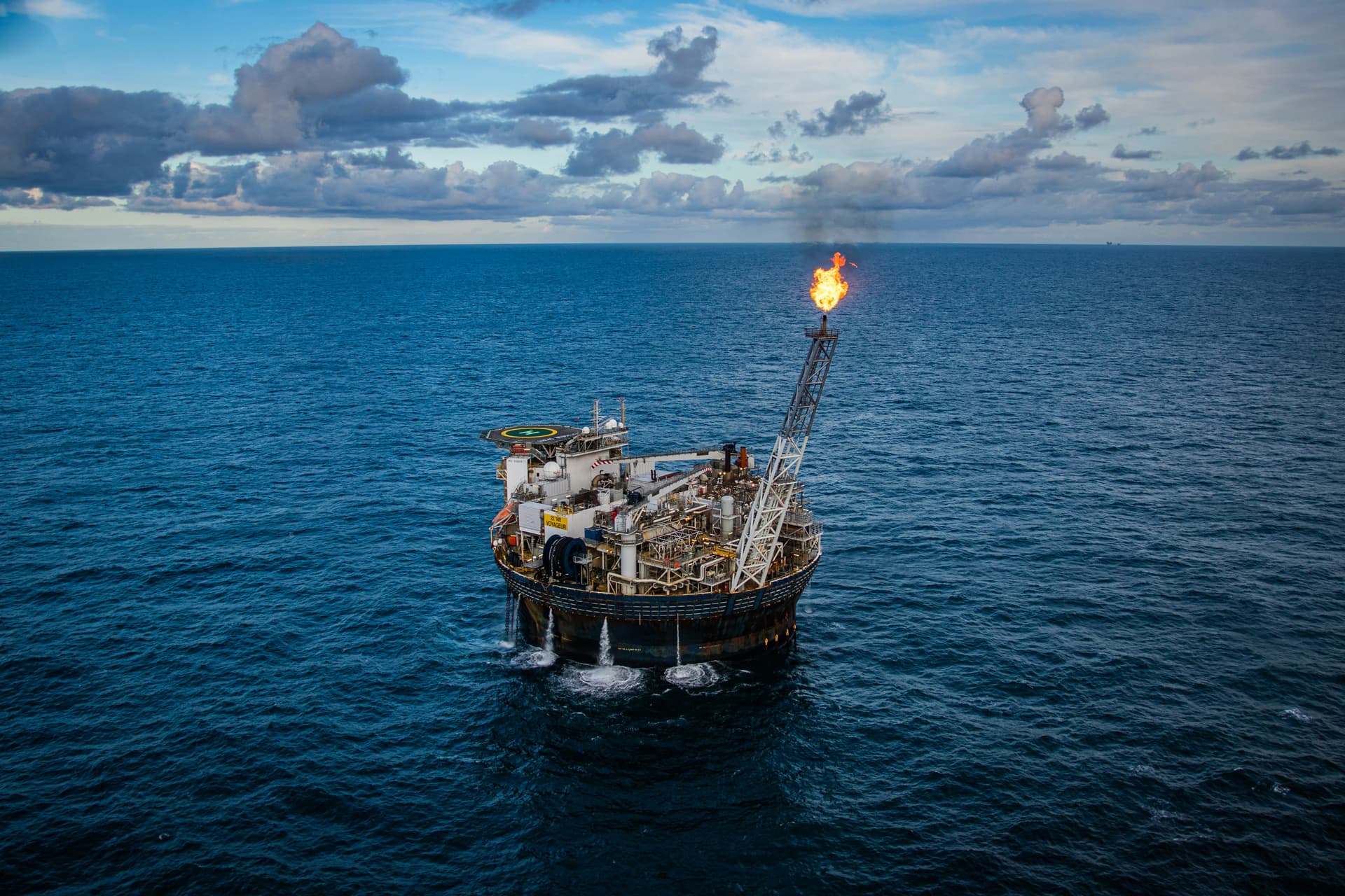 Engineers reviewing oil exploration data